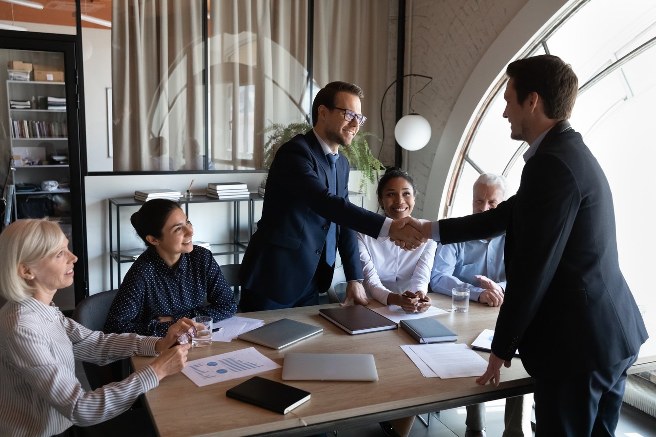 Employer, hr managers welcoming new employee to team